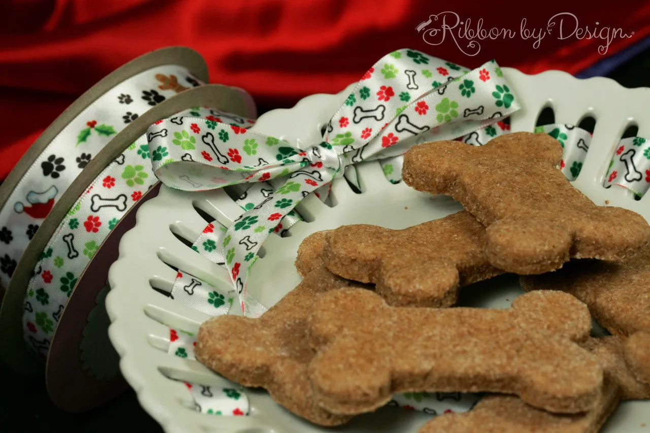 Holiday Dog Bones Ribbon with green and red paw prints on 5/8" white Single Face Satin ribbon